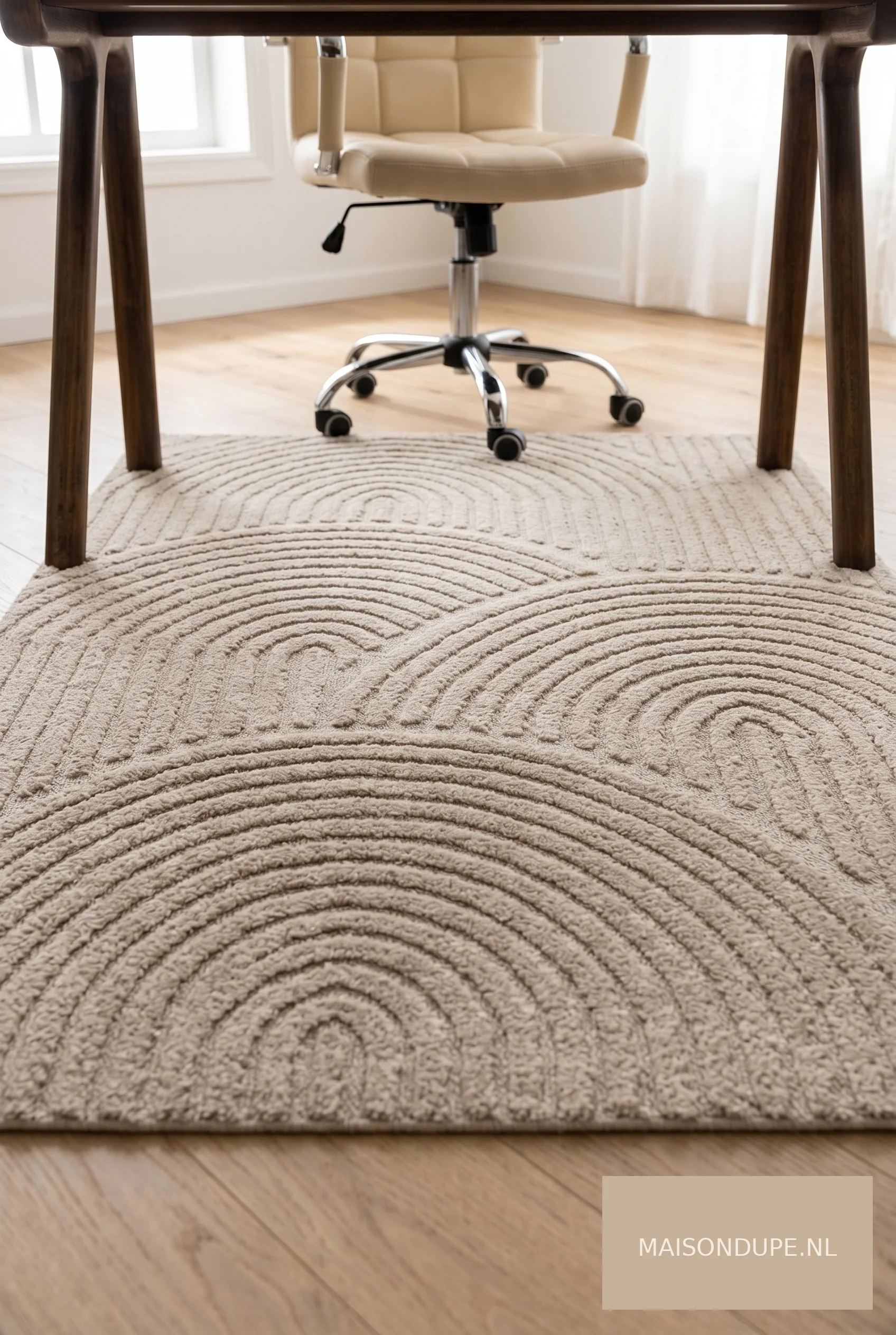 Beige vloerkleed met boogmotief